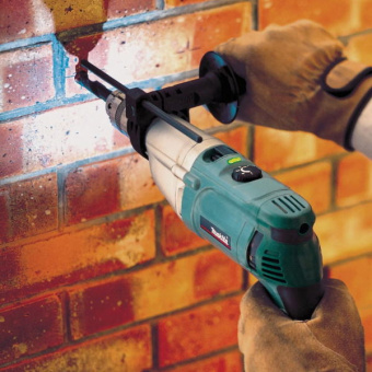 Дрель ударная Makita НР 2070 F кейс